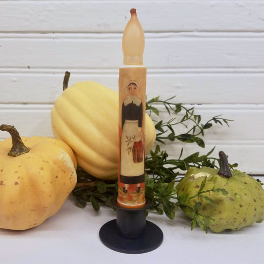 Pilgrim Woman Standing in a Pumpkin Patch LED Battery Operated Candle